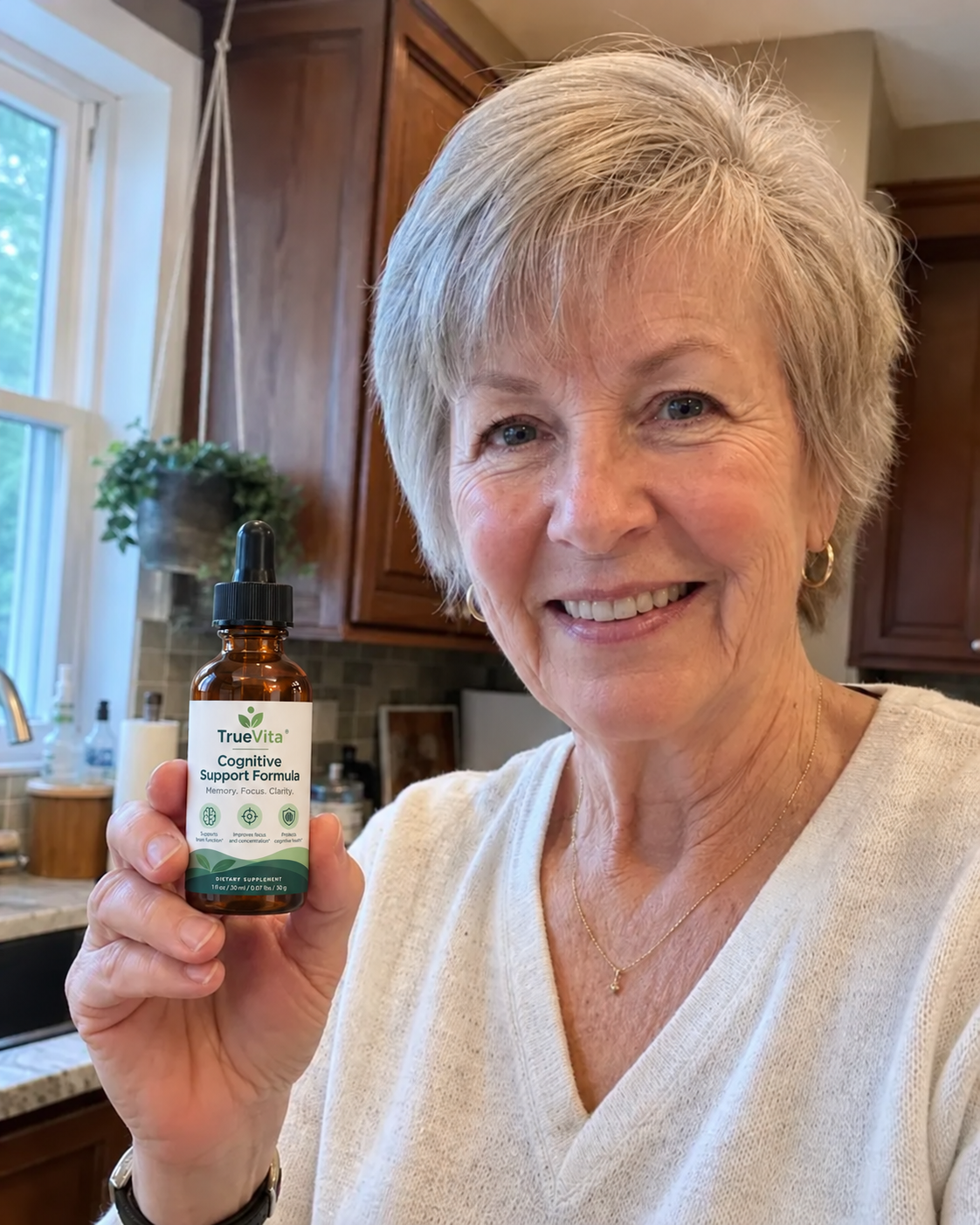Joan M., 64 — TrueVita customer holding her bottle