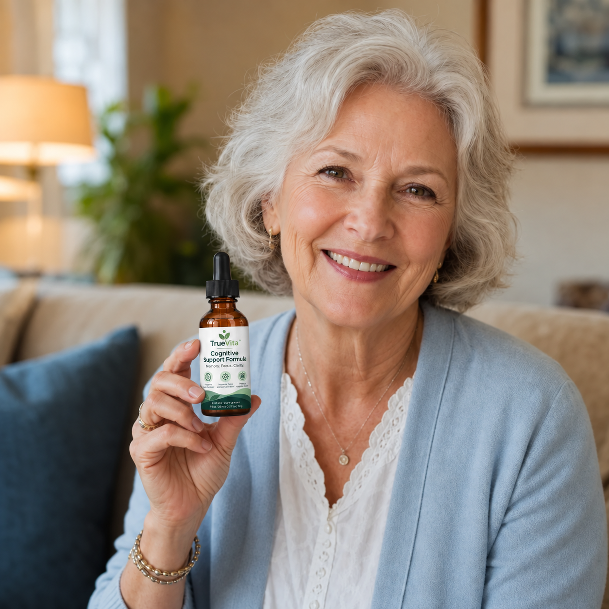 Happy customer holding her TrueVita bottle at home