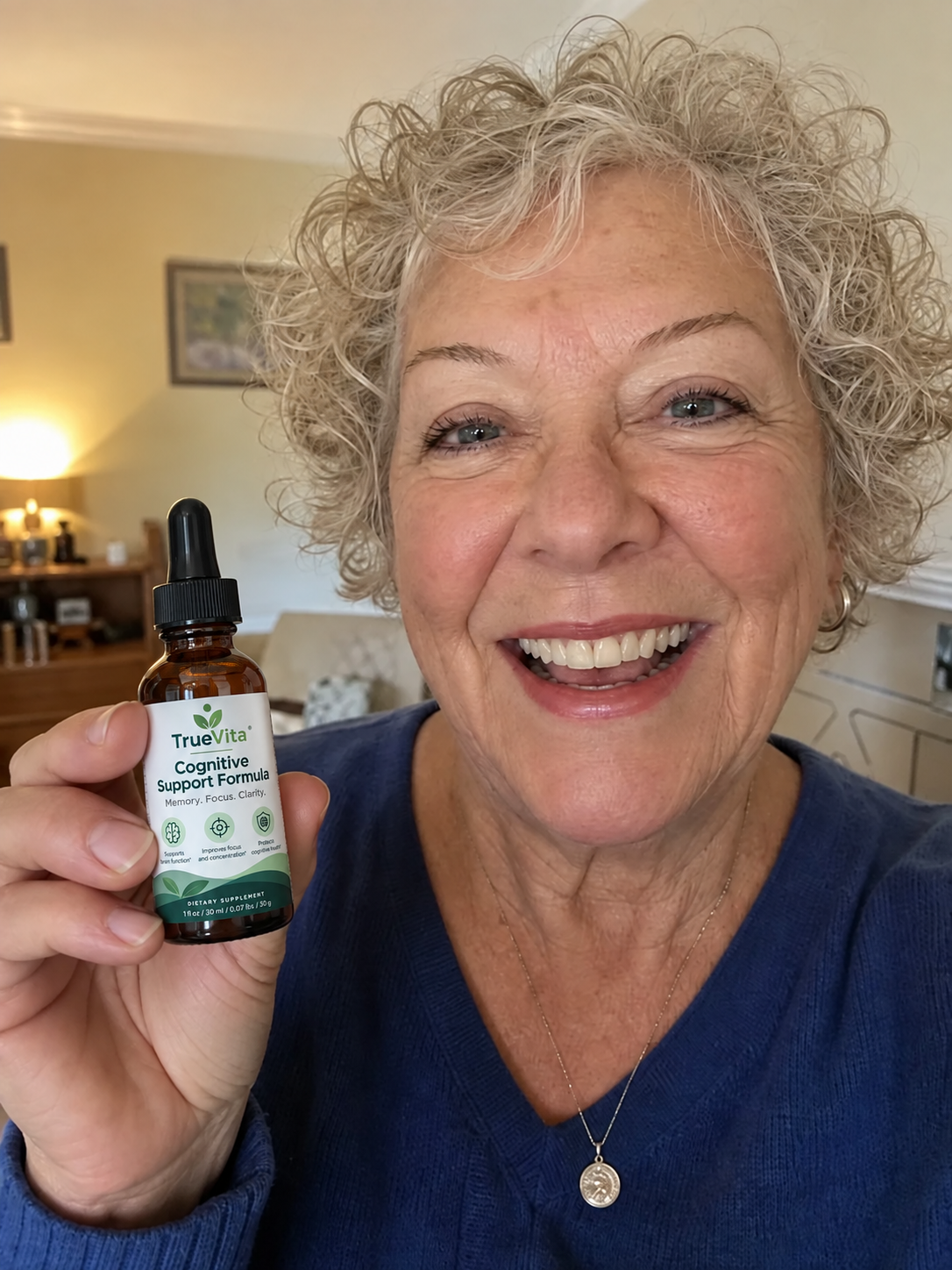 Ruth S. holding her TrueVita bottle at home